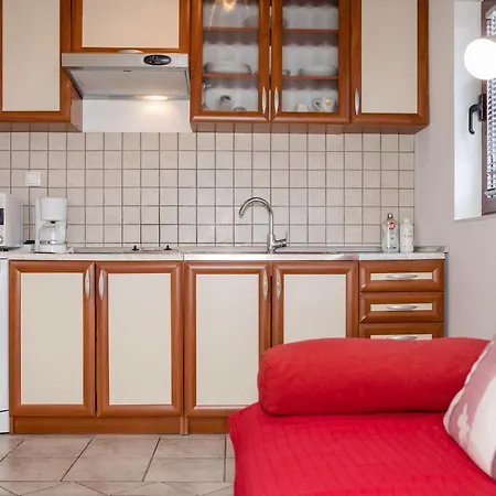Apartments Padovan Banjol Esterno foto